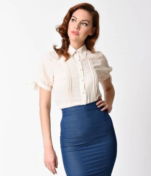 white pleated vintage shirt and fitted navy blue midi skirt
