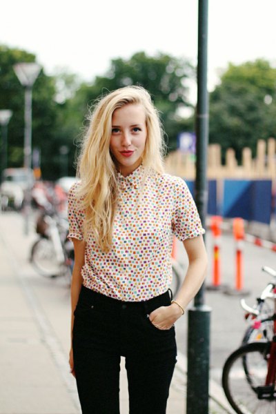 colorful shirt with polka dot buttons and black jeans