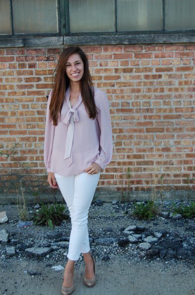 blush pink chiffon blouse with white ankle jeans