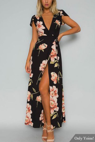 low cut wrap dress with floral pattern in black and white