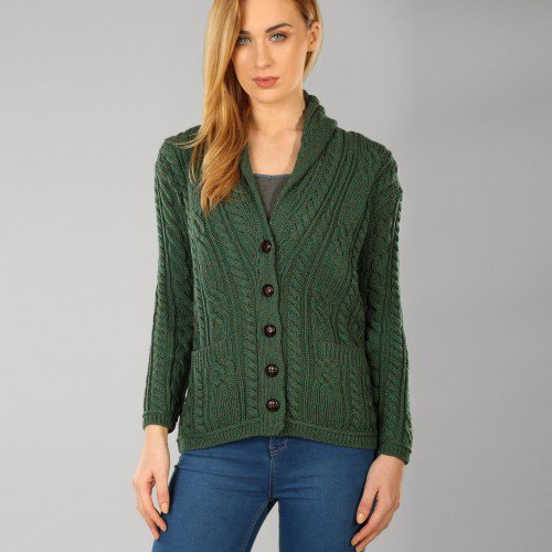dark green knit sweater with unwashed blue skinny jeans