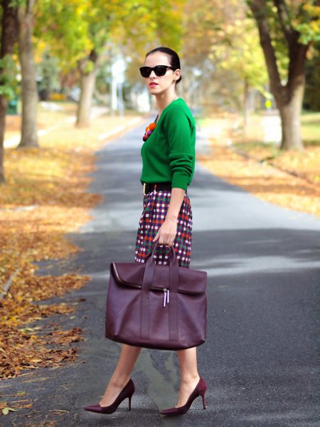 emerald green sweater with plaid pencil skirt