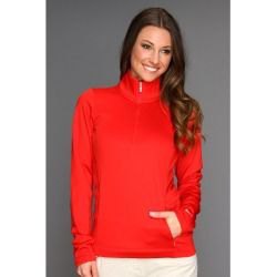 Red half sleeve half zip golf jacket and white jeans