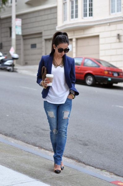 Dark blue blazer jacket with white t-shirt and ripped jeans