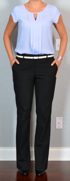 pleated blouse with black chinos and white belt