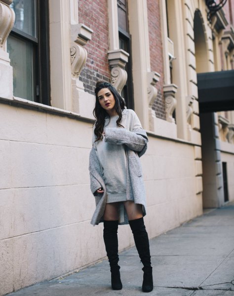 gray dress with a long wool coat and overknee boots