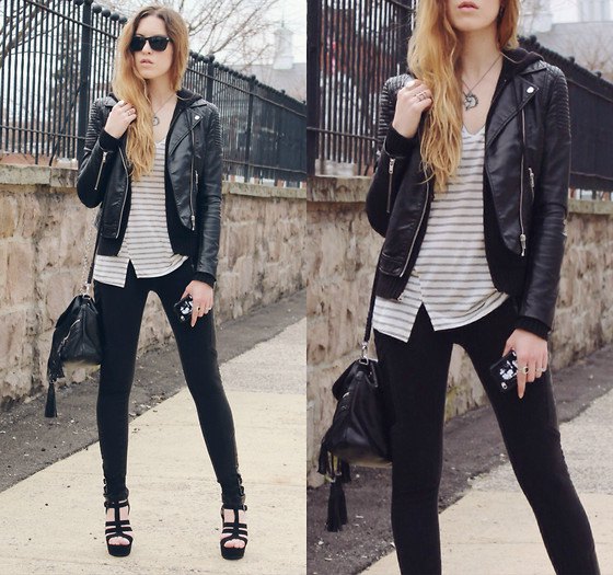 Tailored moto jacket with gray and white striped v-neck top and skinny jeans