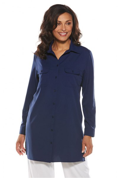 Dark blue tunic shirt with white wide leg jeans