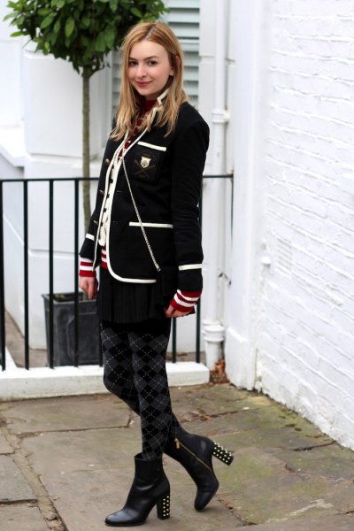black and white golf jacket with tunic top and printed leggings