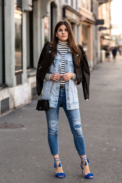 Denim jacket with ripped jeans and royal blue strappy sandals