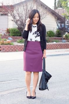 black cardigan with white printed sweater and purple pencil skirt