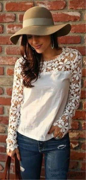 white long-sleeved linen blouse with lace details