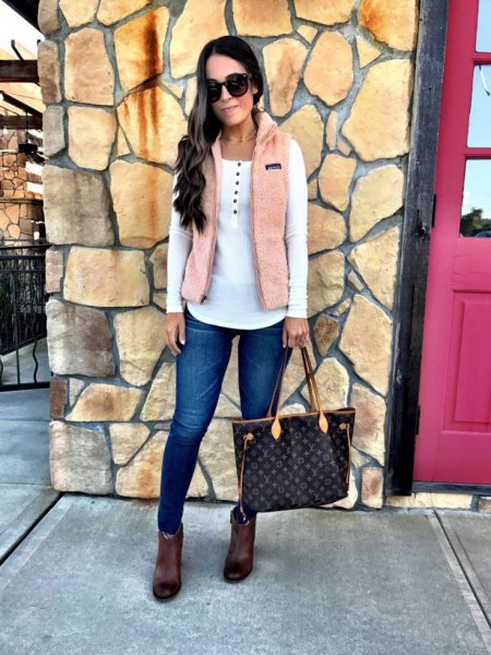 Ivory vest over white booties