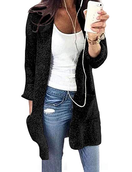 white, figure-hugging tank top with a scoop neckline and black longline cardigan sweater