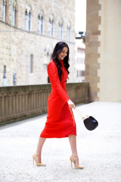 red long-sleeved midi shift dress with pink high heels and pointed toes