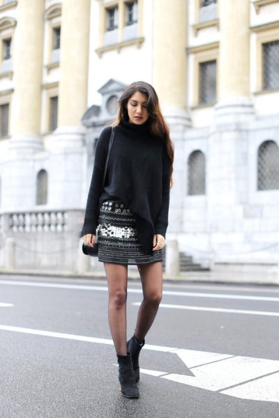 black turtleneck sweater with patterned knitted mini skirt