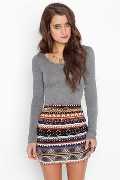 gray long-sleeved top with tribal printed mini skirt