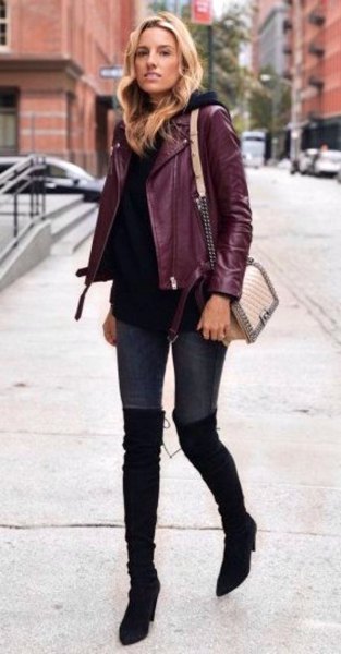 Burgundy jacket with a black sweater and overknee boots