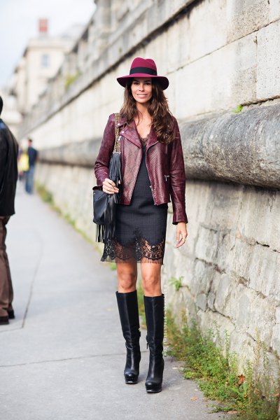 Leather blazer with a black mini dress and a felt hat