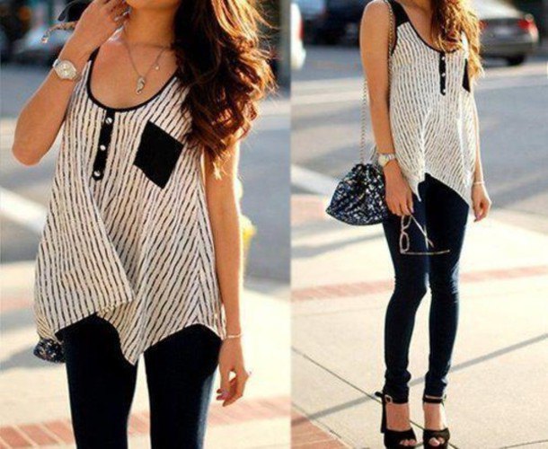 Black and white sleeveless top with tunic and skinny jeans