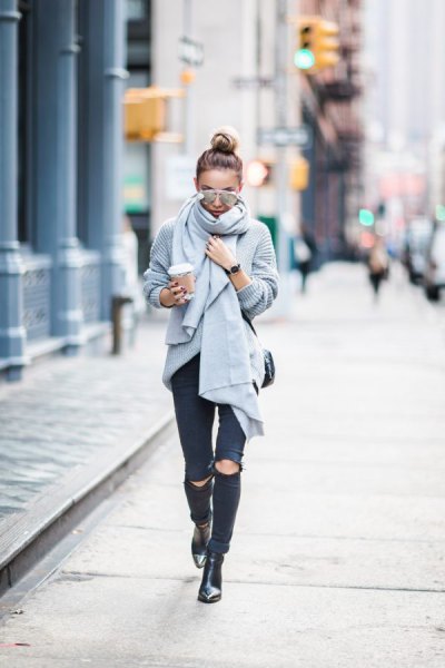 gray ribbed knit scarf with ripped black skinny jeans