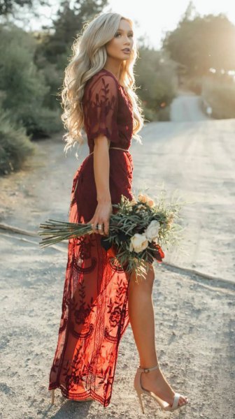 semi-transparent long dress made of burgundy lace