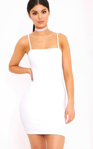 white bodycon dress with spaghetti straps
