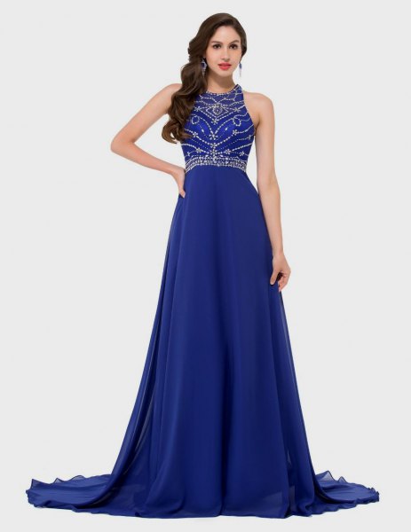 Sequin fit with a halter neckline and a flared royal blue long dress