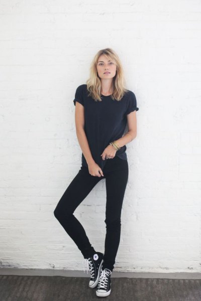 black t-shirt with matching skinny jeans and high top