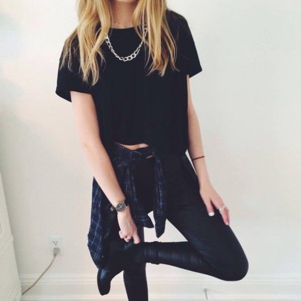 short black t-shirt with leather leggings