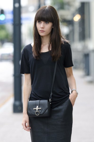 black t-shirt with matching figure-hugging knee-length skirt