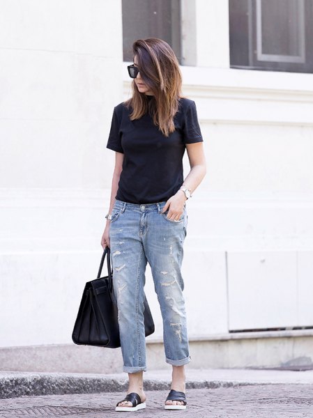 black t-shirt with cuffed jeans and sandals