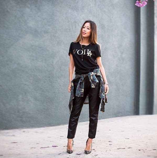 black printed t-shirt with leather trousers and plaid boyfriend shirt