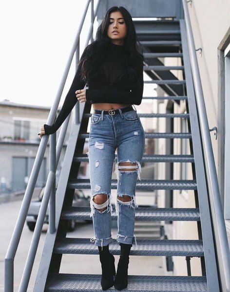black cropped crew neck sweater and ripped jeans