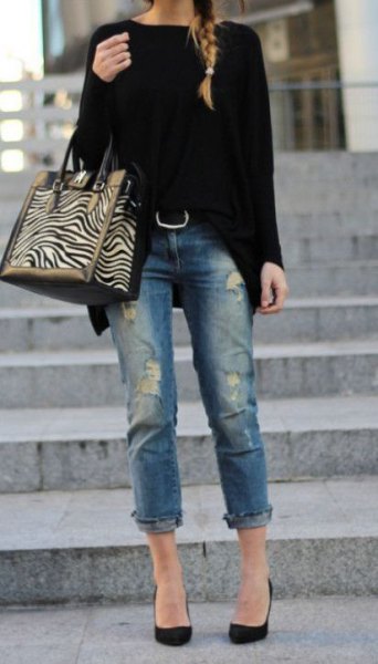 black, thick sweater with cuffed jeans and ballet flats