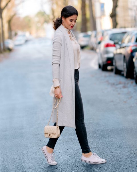 light gray midi cashmere cardigan with light pink blouse and leather pants