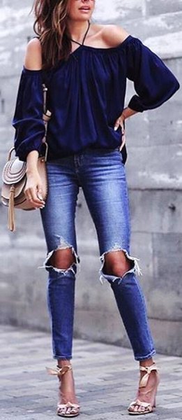 Off the shoulder navy blouse with ripped skinny jeans