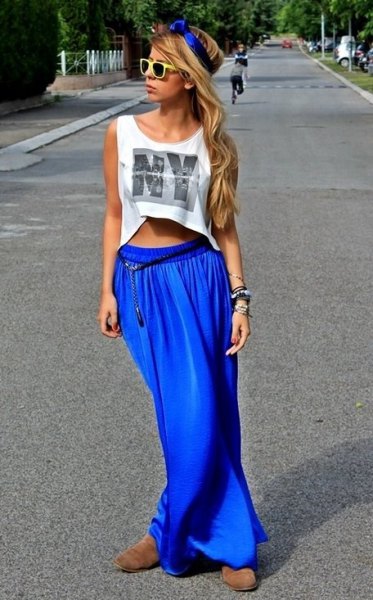 white sleeveless t-shirt with cropped print and blue maxi skirt with elastic waist