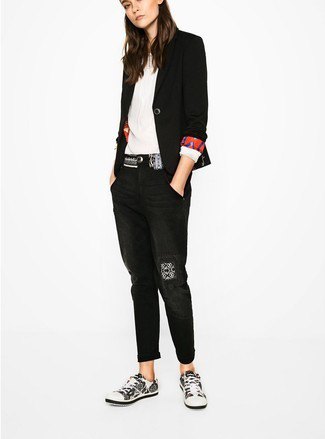 black blazer with white pleated blouse and cuffed jeans