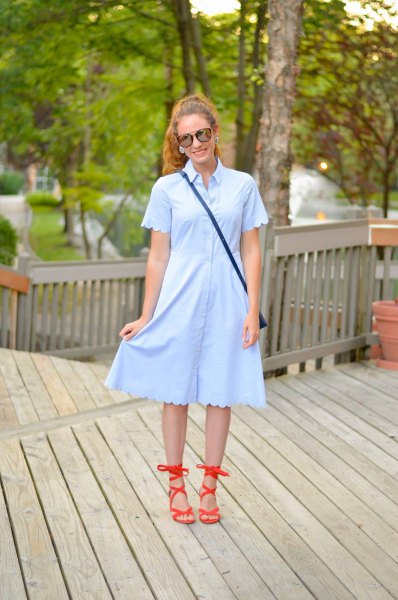 light blue shirt dress with scalloped sleeves and hem