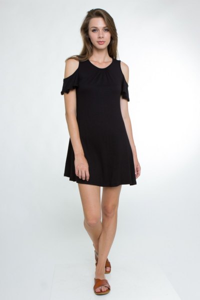 black swing dress with cold shoulders and ruffled sleeves