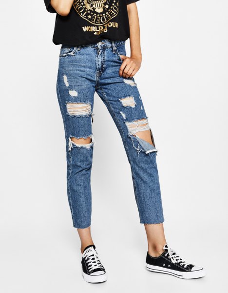 black printed t-shirt ripped blue jeans