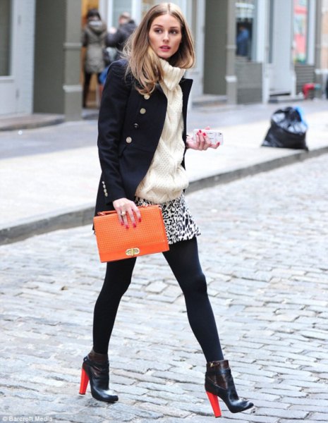 black wool coat with leopard print mini skirt and brown leather handbag