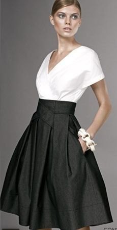 V-neck white wrap blouse and black high waist midi skirt with pockets
