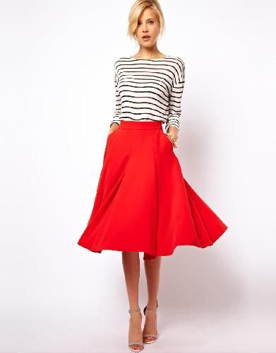 black and white striped long sleeve t-shirt with red midi skirt