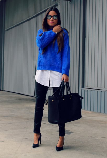 ribbed blue sweater over long button white shirt