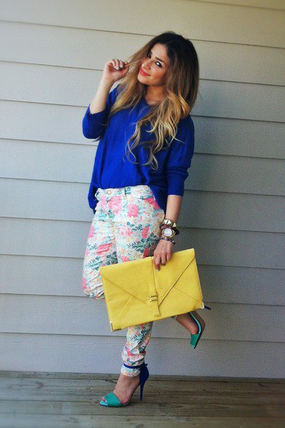 Blue chunky sweater with white pants with tapered legs and floral pattern