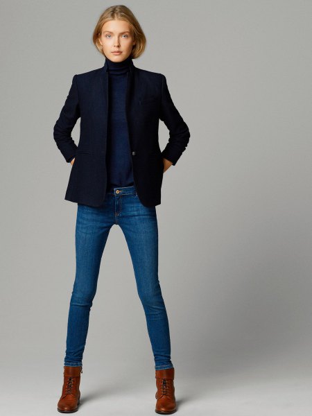Dark blue turtleneck sweater, matching jacket and skinny jeans