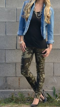 blue denim jacket with black tunic tank top and leggings