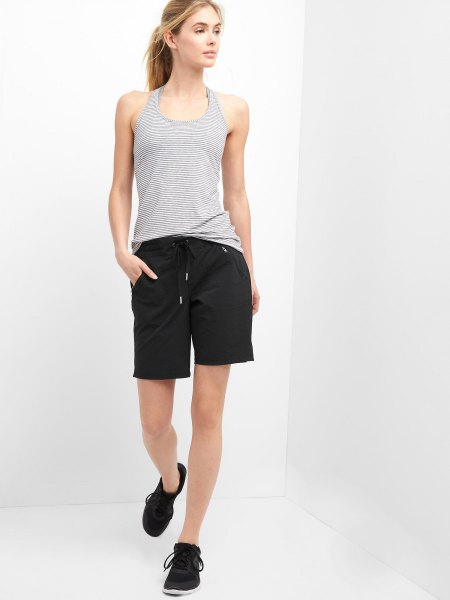 black hiking shorts with striped vest top